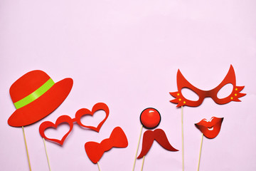 Props for party. Carnival accessories set. Paper glasses, hat, lips, moustaches, tie on wooden...