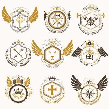 Heraldic decorative emblems made with royal crowns, animal illustrations, religious crosses, armory and medieval castles. Collection of symbols in vintage style.