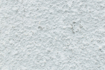 Background of white plaster on the wall.