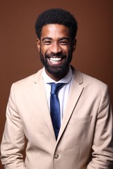 Beautiful black man in front of a colored background