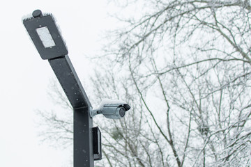 CCTV in the winter on a pole.