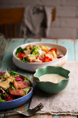 Caesar salad  in ceramic bowl .selective focus