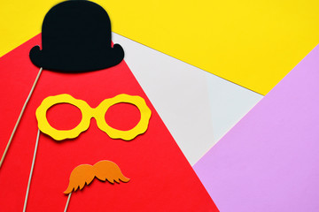Props for party. Carnival accessories set. Paper glasses, hat, lips, moustaches, tie on wooden...