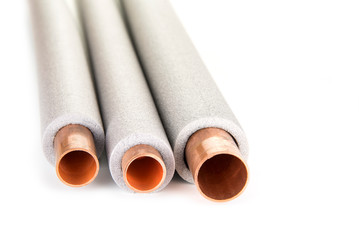Insulation for heating pipes on a white background