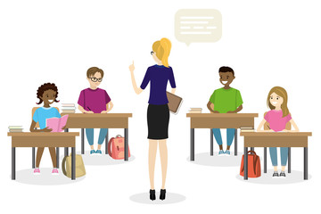 Students teens sitting in the workplace front view, and female teacher standing back view