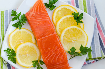 piece of raw salmon on a plate