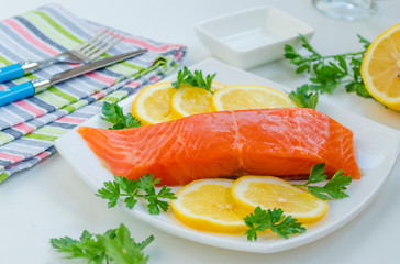 piece of raw salmon on a plate
