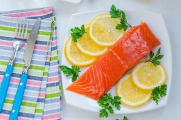 piece of raw salmon on a plate