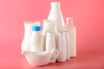 Different milk products on color background