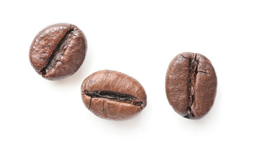 Roasted coffee beans on white background