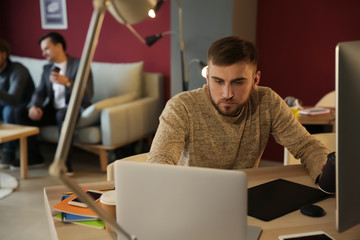 IT specialist working in office
