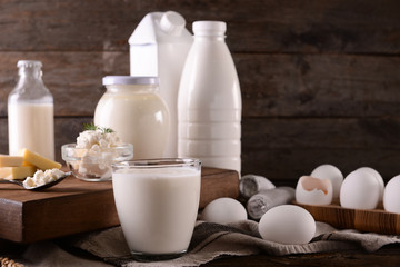 Obraz na płótnie Canvas Different milk products on wooden table