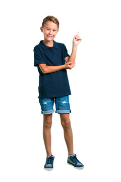 Full Body Of Little Boy Pointing With The Index Finger A Great Idea On White Background