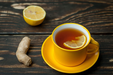 lemon ginger tea on wooden table