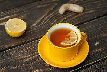 lemon ginger tea on wooden table