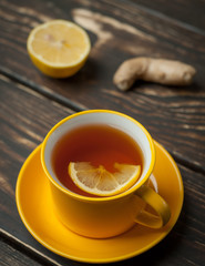 lemon ginger tea on wooden table