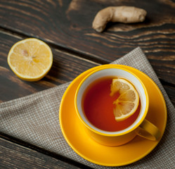 lemon ginger tea on wooden table