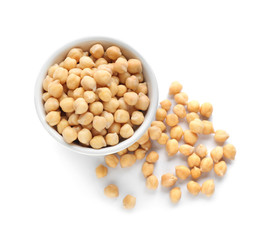 Bowl with chickpeas on white background