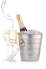 Bottle with champagne and two full wineglasses