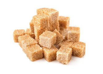 Brown cane sugar cubes on white background