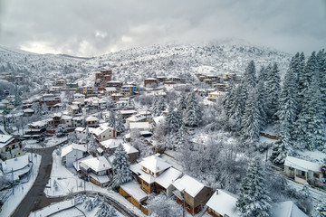 Aerial View of Seli Traditional Greek Village Covered by Snow in Winter Morning