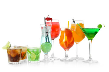 Tasty cocktails on white background