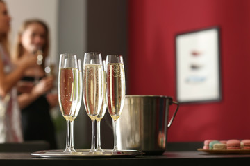Glasses of champagne on table at party