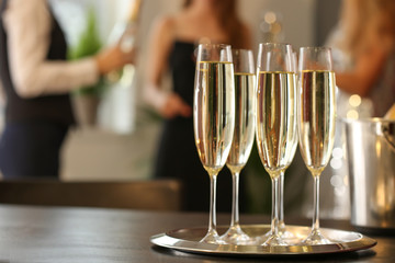 Glasses of champagne on table at party