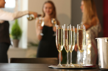 Glasses of champagne on table at party