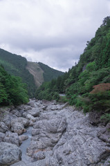 Fototapeta na wymiar Mountain river flowing through the Mitarai ravine Nara.