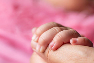 Newborn baby's hand