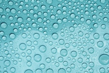 drops water on blue background