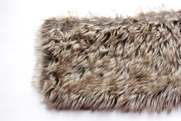 Strip of grey wool on white