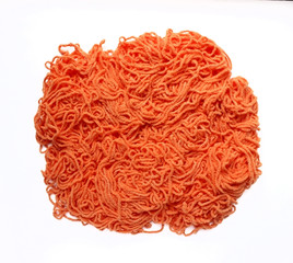 orange of yarn for knitting on white