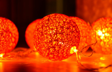 Christmas garland in the form of merging balls of thread, glows in the dark