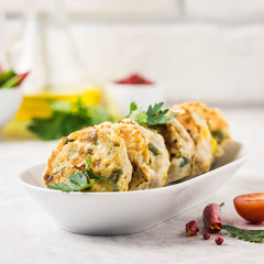 Chicken vegetables rissoles on white marble background. Selective focus, space for text.