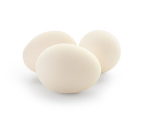 Raw chicken eggs on white background