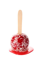 Stick with delicious caramel apple on white background