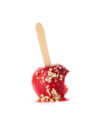 Stick with delicious caramel apple on white background