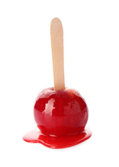 Stick with delicious caramel apple on white background