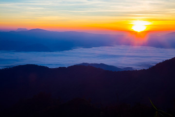 Fototapeta na wymiar Morning sunrise over mist .