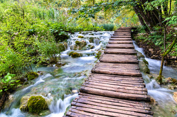Wooden pathway above water at Plitvice National Park in Croatia