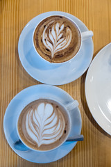 Coffee or chocolate latte art in white cup