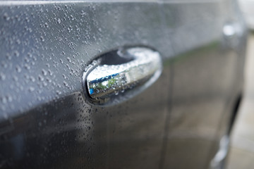 Car door handle with drops the rain