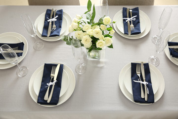 Festive table setting for Christmas dinner