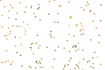 Bunch of gold stars on white background.