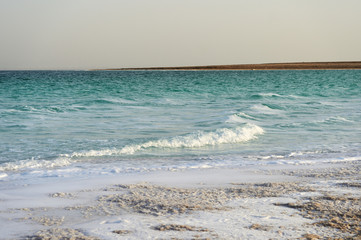 Dead Sea seashore in the evening in cloudy weather