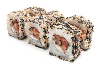 Tasty sushi rolls on white background