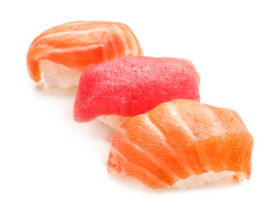 Tasty sushi on white background