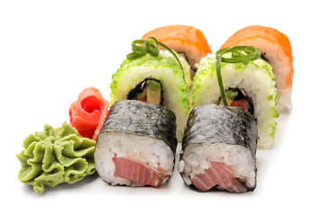 Tasty sushi rolls on white background